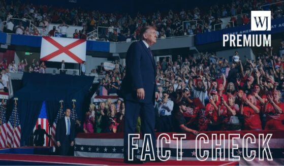 President Donald Trump arrives onstage for a campaign rally in the Mitchell Center at the University of South Alabama Friday in Mobile, Alabama.