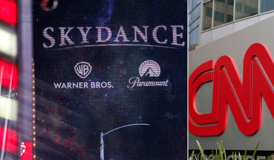A Skydance billboard, left, is seen Tuesday outside of Paramount Global headquarters in Times Square in New York City. CNN was part of Paramount's $110 billion acquisition of Warner Bros. Discovery.