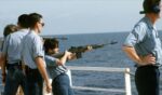 An instructor supervises shooting of an M-14 rifle during a practice session aboard a U.S. Navy ship in a file photo taken during Operation Desert Shield.