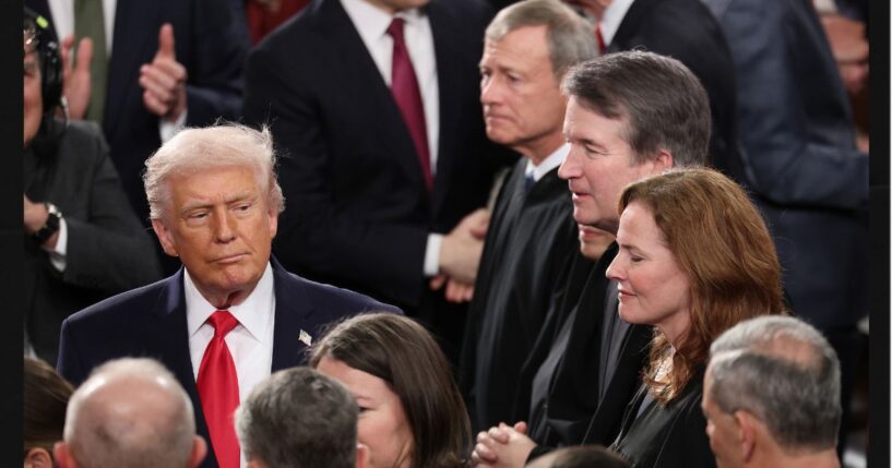 President Donald Trump walks past Supreme Court Chief Justice John Roberts, Associate Justice Elena Kagan, Associate Justice Brett Kavanaugh and Associate Justice Amy Coney Barrett on Feb. 24 as he arrives for the State of the Union address during a joint session of Congress at the U.S. Capitol in Washington, D.C.