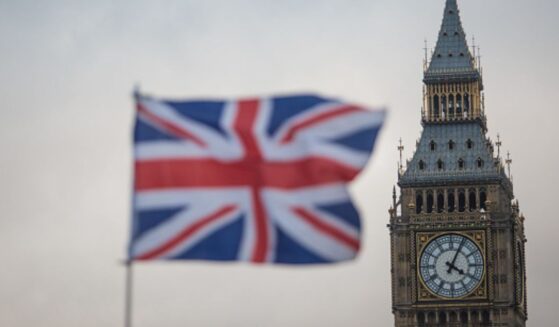 A Union Jack flag flies right in front of the Parliamentary Clock Tower in London, Britain on February 1, 2017.