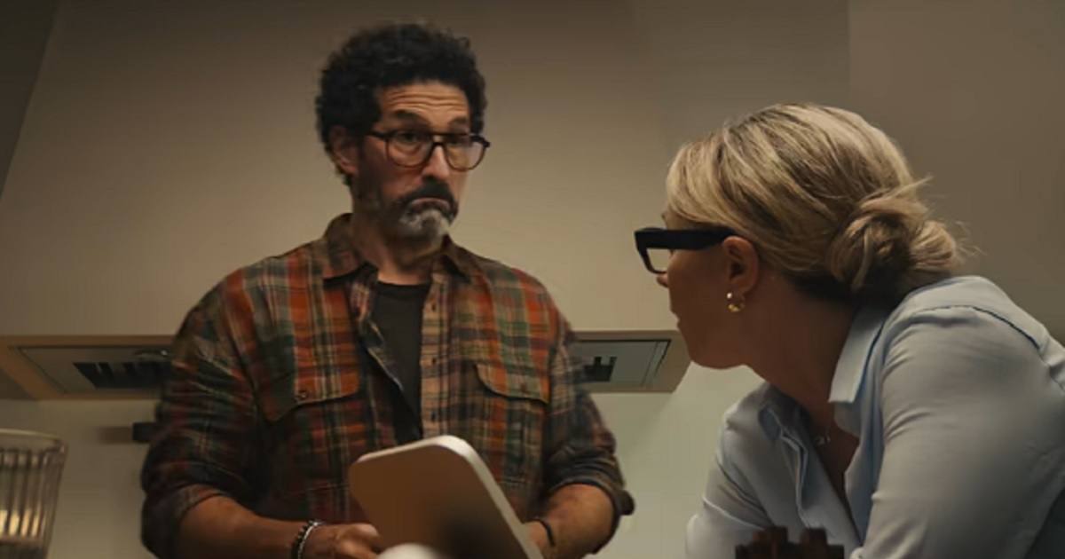 A dumb-looking man and a girlboss wife in a scene from Apple's ad for its new HomeView product.