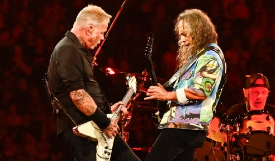James Hetfield of Metallica, left, pictured jamming with lead guitarist Kirk Hammett in an August 2024 performance at Gillette Stadium in Foxborough, Massachusetts.